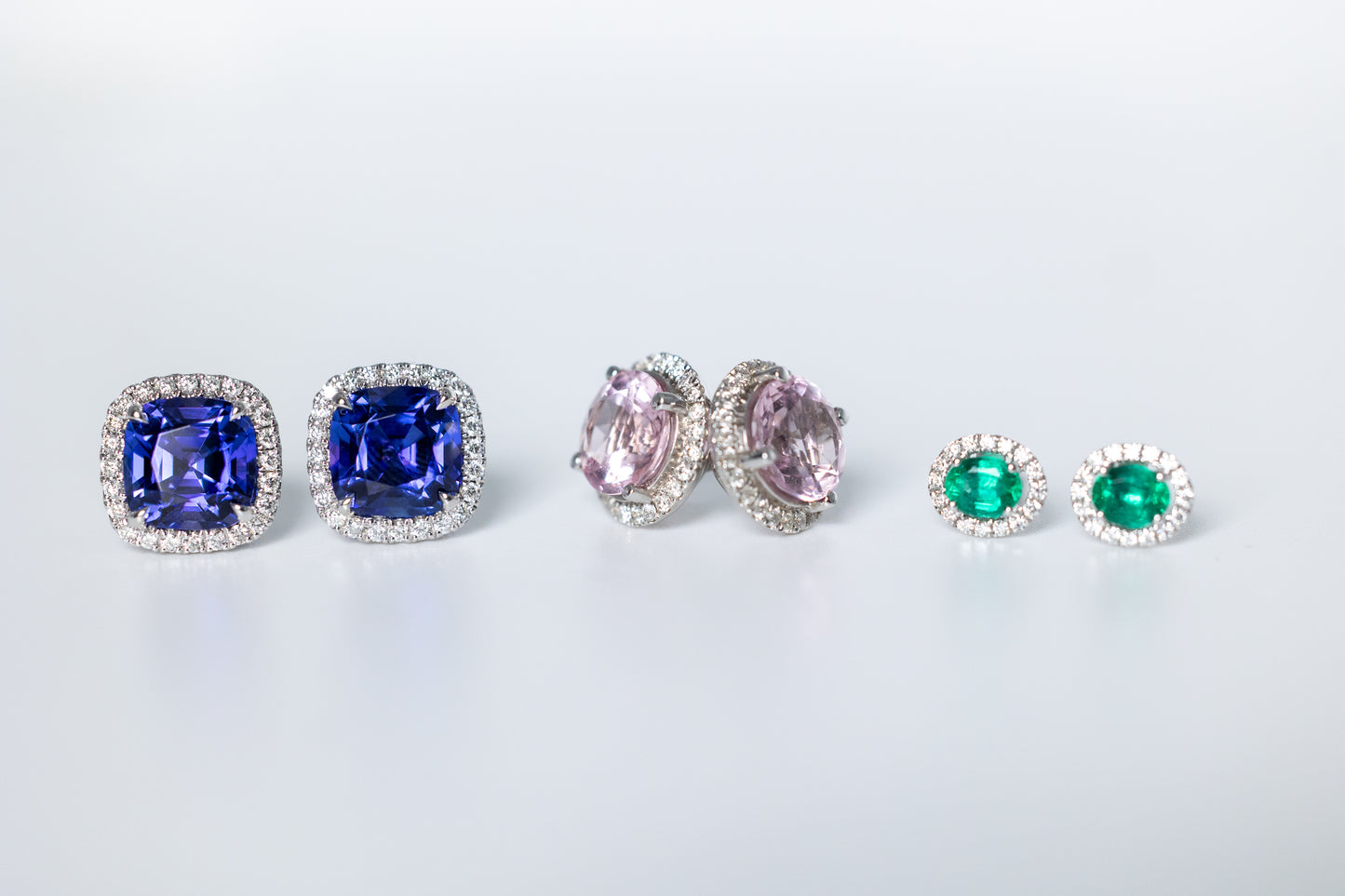 Emerald and Diamond Stud Earrings in Oval Cut Shape