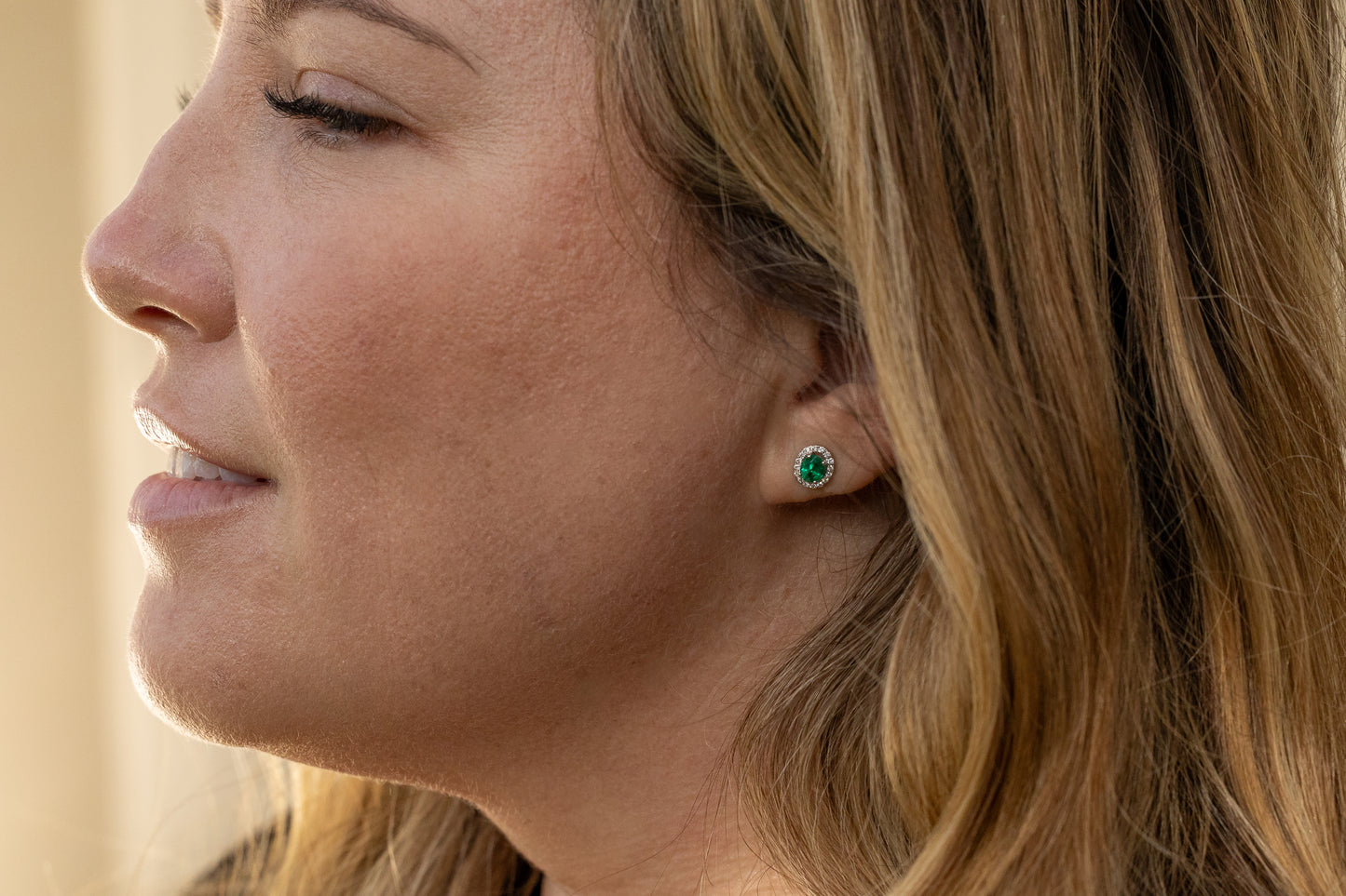 Emerald and Diamond Stud Earrings in Oval Cut Shape