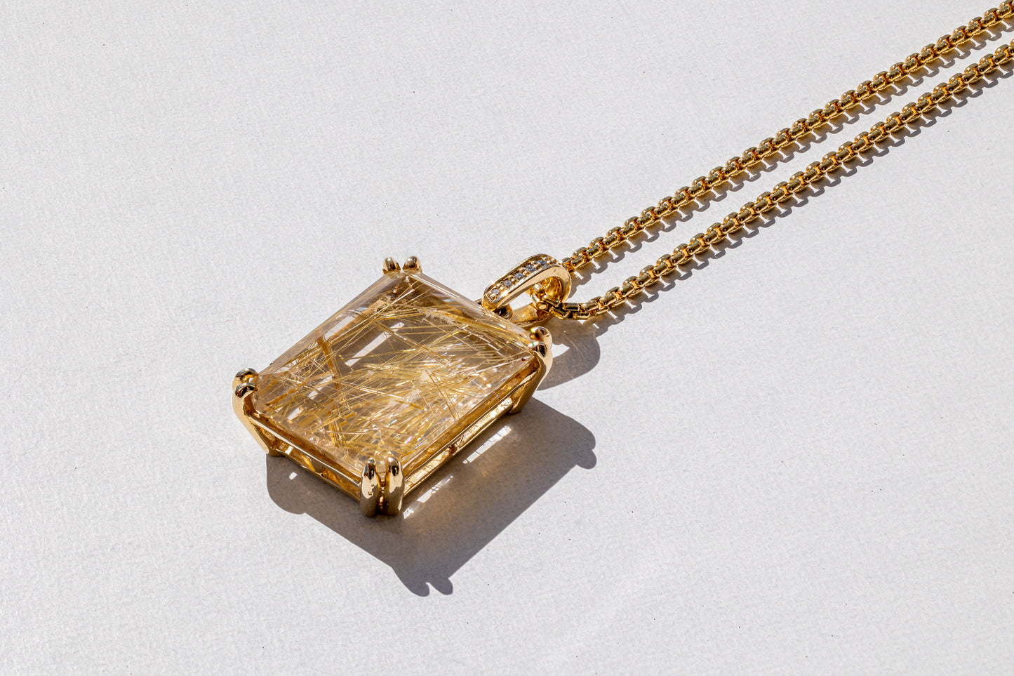 Rutilated Quartz and Diamond Bale Pendant in 18K Yellow Gold