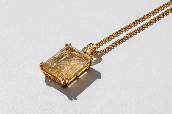 Rutilated Quartz and Diamond Bale Pendant in 18K Yellow Gold