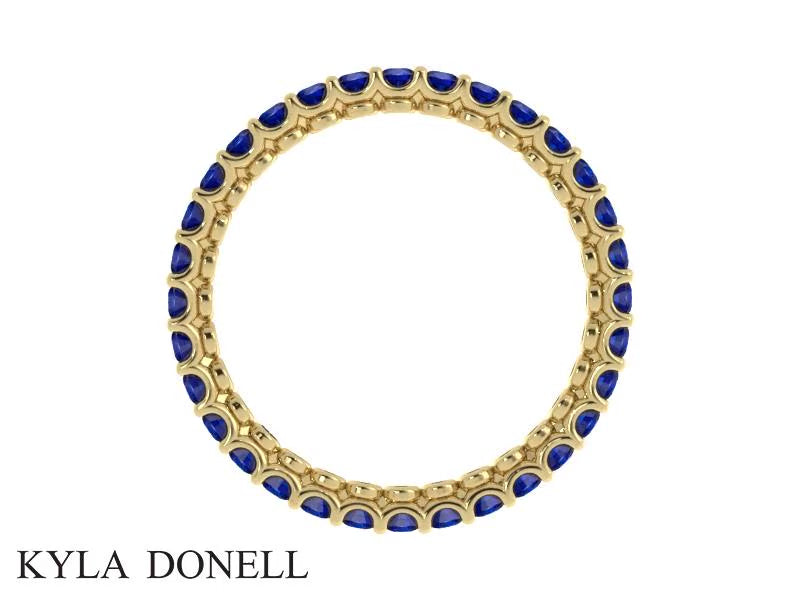 Load and play video in Gallery viewer, Blue Sapphire Stackable Eternity Band in 18kt Yellow Gold
