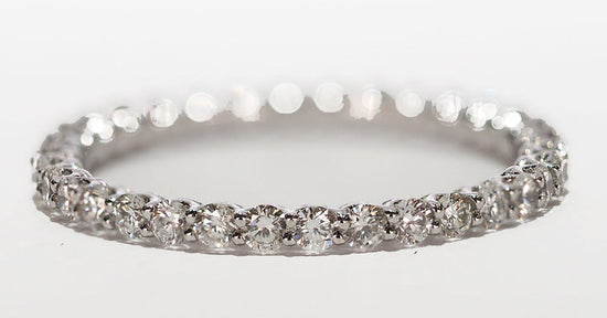 Load image into Gallery viewer, Diamond eternity band in 18k WG
